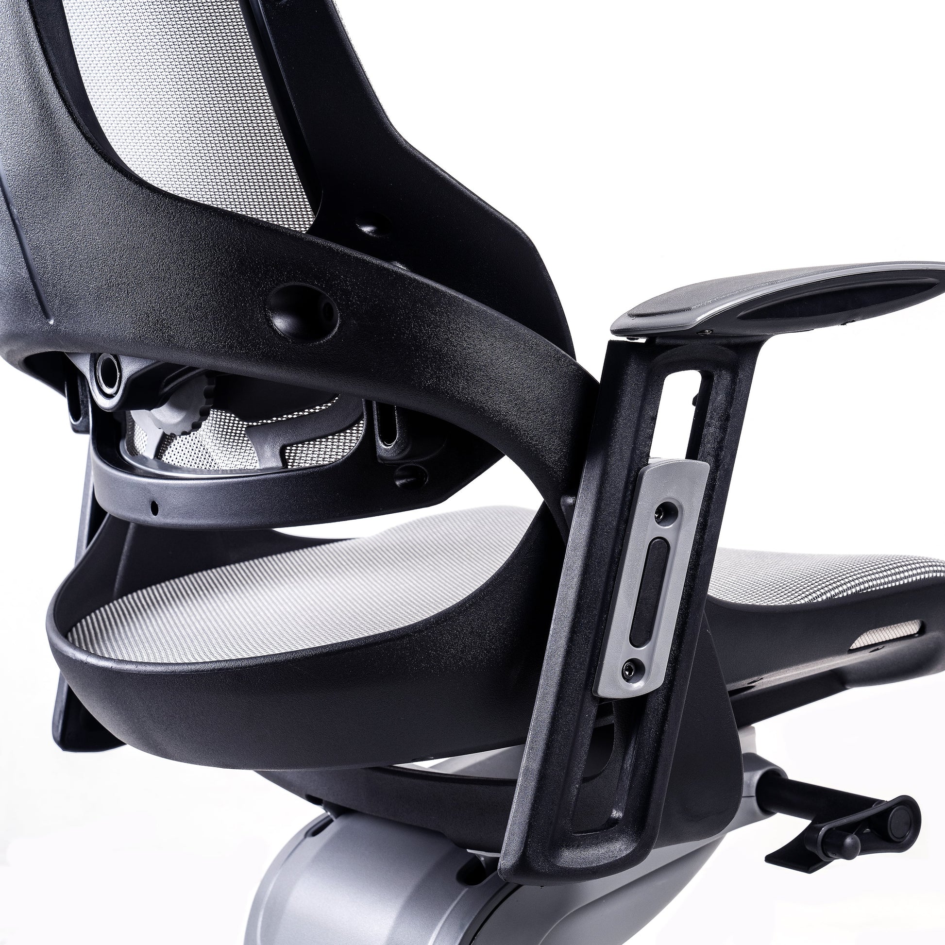 zoomed back view of an ergonomic office chair for back pain